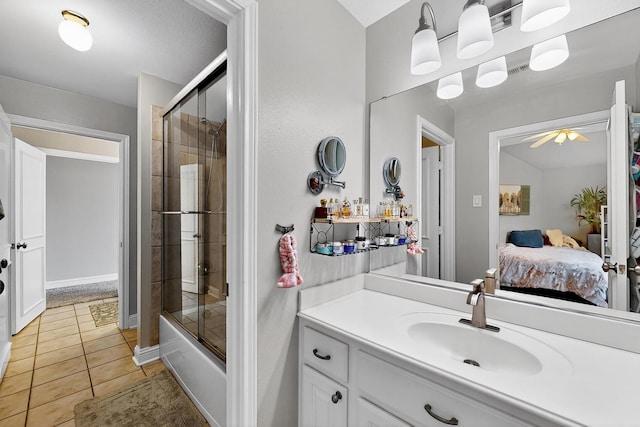 4700 Scoter Ln, Mckinney, TX 75072 - bathroom featuring ensuite bath, tile patterned floors, ceiling fan, shower / bath combination with glass door, and vanity