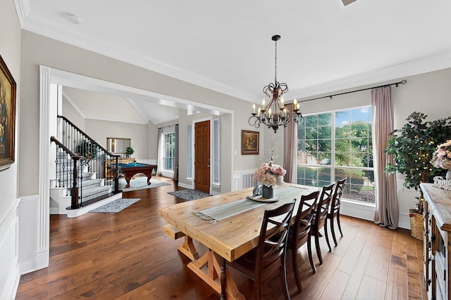 4700 Scoter Ln, Mckinney, TX 75072 - dining area with healthy amount of natural light, stairs, wainscoting, a chandelier, and hardwood / wood-style floors