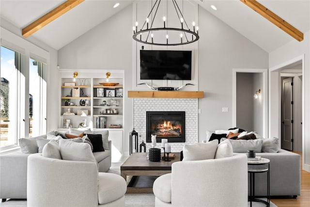200 Sutherland Cres, Northlake, TX 76247 - living room with high vaulted ceiling, beam ceiling, a fireplace, wood finished floors, and a chandelier