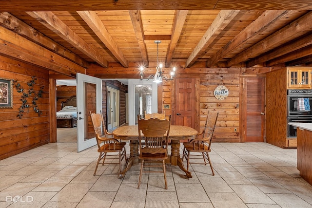 250 Mayo Rd, Shreveport, LA 71106 - dining space featuring wood ceiling with exposed beams, wooden walls, and a chandelier