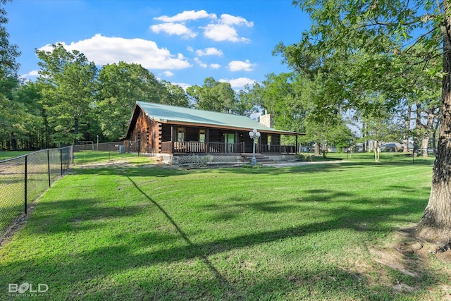 250 Mayo Rd, Shreveport, LA 71106 - back of property with a chimney, log exterior, covered porch, and metal roof