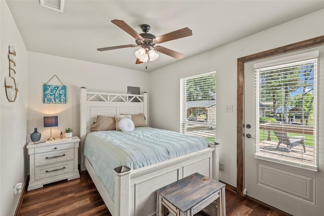 102 Anderson Ln, Mabank, TX 75156 - bedroom with dark wood-style floors, access to outside, baseboards, and ceiling fan