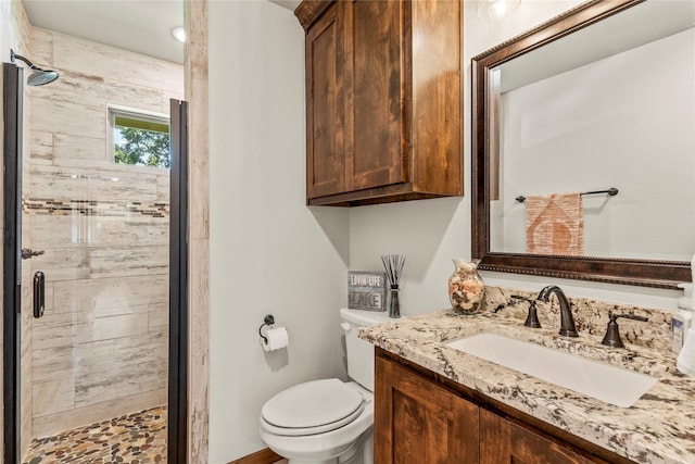 102 Anderson Ln, Mabank, TX 75156 - full bathroom featuring a stall shower, vanity, and toilet