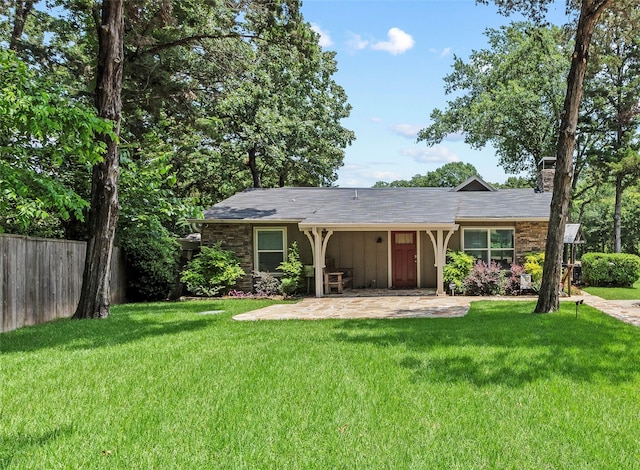 102 Anderson Ln, Mabank, TX 75156 - single story home with a chimney and a patio