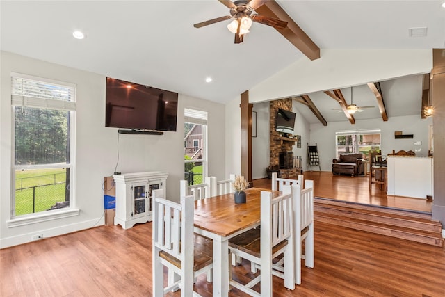 102 Anderson Ln, Mabank, TX 75156 - dining area with a fireplace, a ceiling fan, wood finished floors, and recessed lighting