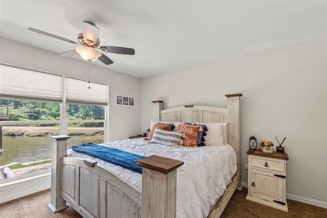 102 Anderson Ln, Mabank, TX 75156 - bedroom with dark colored carpet, a water view, ceiling fan, and baseboards