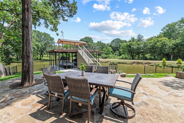 102 Anderson Ln, Mabank, TX 75156 - view of patio / terrace with outdoor dining area, stairs, and view of scattered trees