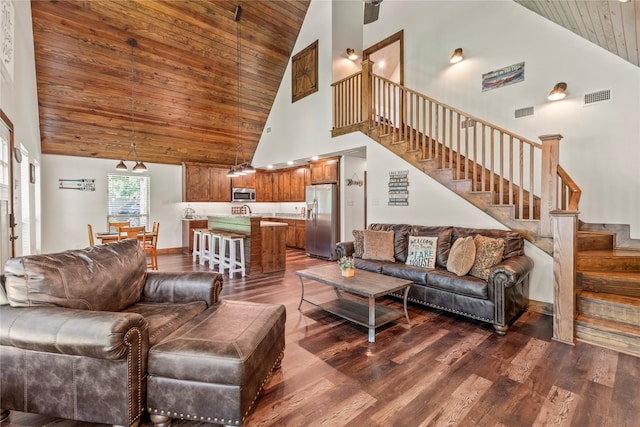 102 Anderson Ln, Mabank, TX 75156 - living area featuring high vaulted ceiling, wood ceiling, stairs, and dark wood-style floors