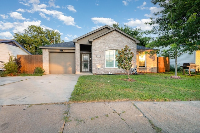 3760 Soft Wind Dr, Dallas, TX 75241 - ranch-style house with brick siding, a garage, and driveway