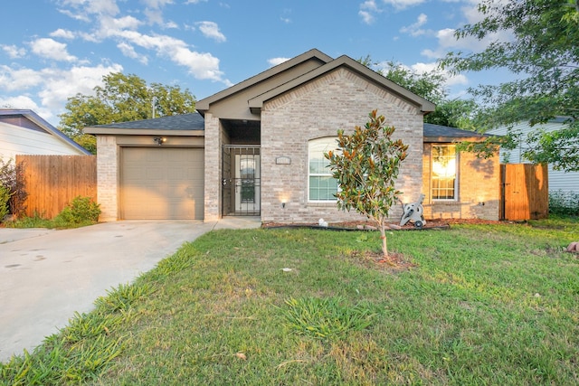 3760 Soft Wind Dr, Dallas, TX 75241 - single story home featuring brick siding, an attached garage, and driveway