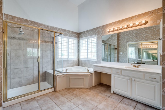 2673 April Sound Ln, Frisco, TX 75033 - full bathroom with a garden tub, vanity, a stall shower, plenty of natural light, and wallpapered walls