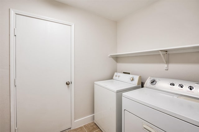 10556 Midway Dr, Frisco, TX 75035 - laundry area with washing machine and dryer, light tile patterned floors, and baseboards