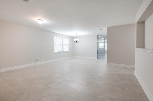 10556 Midway Dr, Frisco, TX 75035 - unfurnished room featuring a chandelier and baseboards