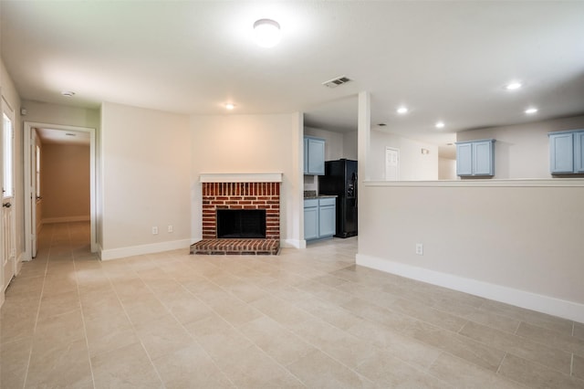 10556 Midway Dr, Frisco, TX 75035 - unfurnished living room with baseboards, recessed lighting, light tile patterned floors, and a fireplace