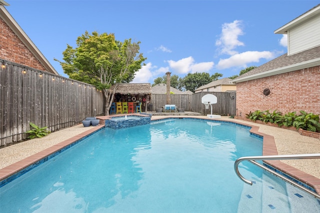 3820 Nash Ln, Plano, TX 75025 - view of swimming pool featuring a fenced backyard and a pool with connected hot tub
