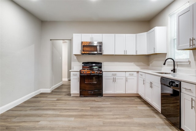 1633 Stoneman, Dallas, TX 75215 - kitchen with range with gas cooktop, dishwasher, stainless steel microwave, a sink, and light countertops