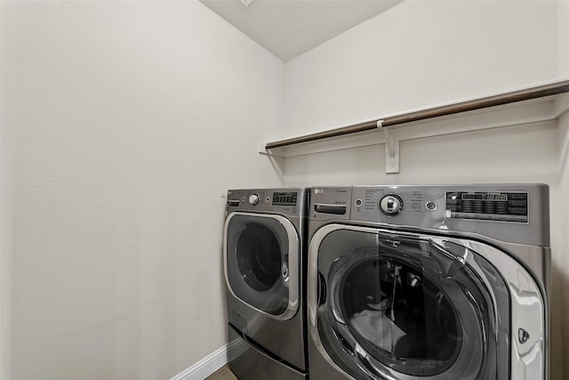 3300 Calvin Rd, Mckinney, TX 75071 - laundry room featuring washer and dryer and baseboards