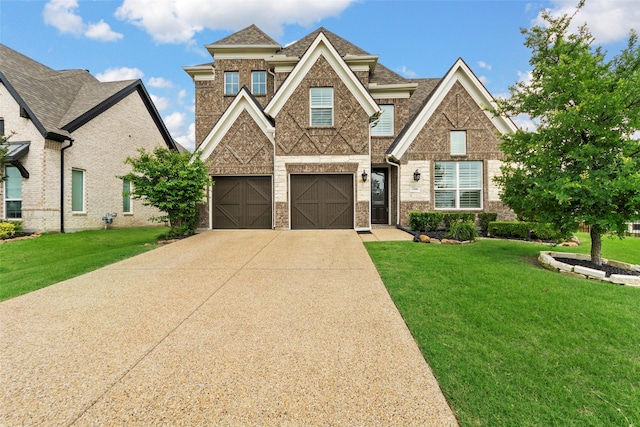 3300 Calvin Rd, Mckinney, TX 75071 - view of front of home with a garage, concrete driveway, a front yard, brick siding, and roof with shingles