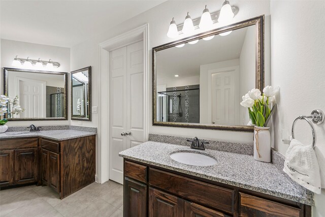 3300 Calvin Rd, Mckinney, TX 75071 - bathroom with two vanities, tile patterned flooring, and a shower