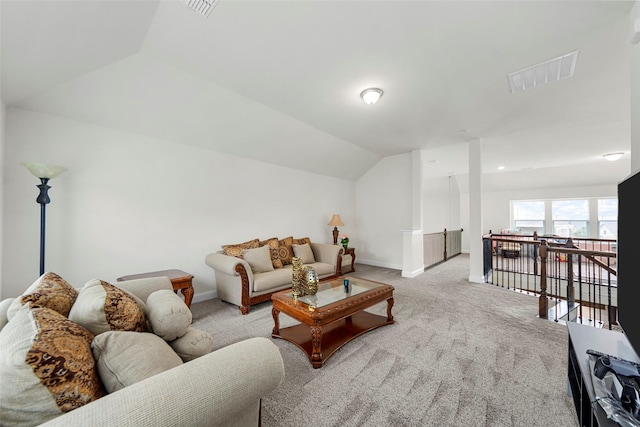3300 Calvin Rd, Mckinney, TX 75071 - living room featuring vaulted ceiling, light carpet, and baseboards