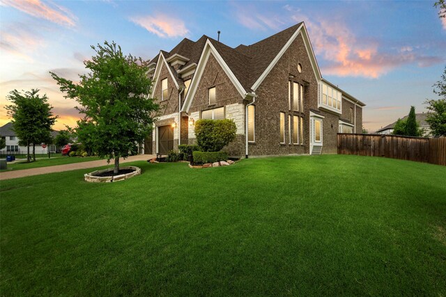 3300 Calvin Rd, Mckinney, TX 75071 - view of front facade with roof with shingles, a garage, brick siding, driveway, and stone siding