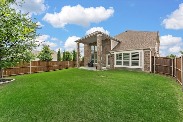 3300 Calvin Rd, Mckinney, TX 75071 - back of house featuring brick siding, a patio, and a shingled roof