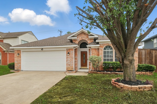 3220 Steamboat Dr, Fort Worth, TX 76123 - view of front of home featuring a garage, driveway, roof with shingles, and brick siding