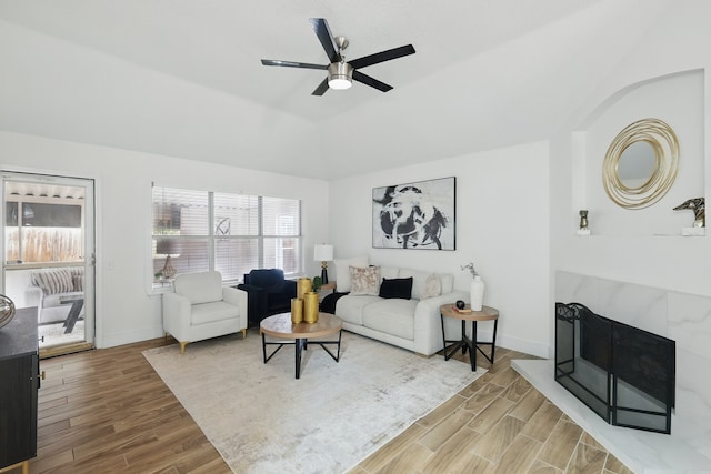 3220 Steamboat Dr, Fort Worth, TX 76123 - living room featuring wood finished floors, ceiling fan, baseboards, and lofted ceiling