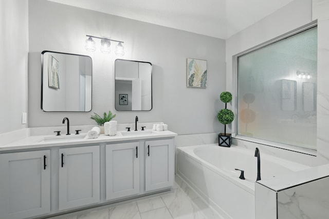 3220 Steamboat Dr, Fort Worth, TX 76123 - full bath featuring a garden tub, double vanity, and marble look tiles