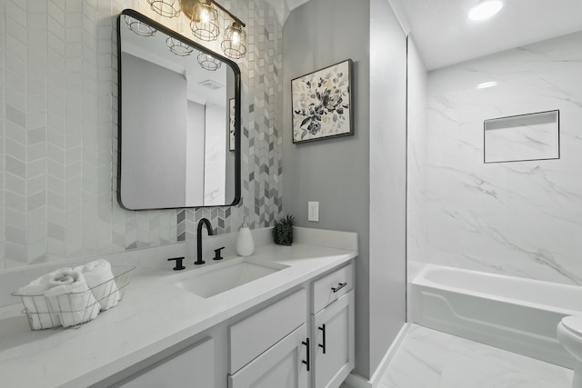 3220 Steamboat Dr, Fort Worth, TX 76123 - full bath featuring marble look tile flooring, vanity, toilet, and shower / washtub combination
