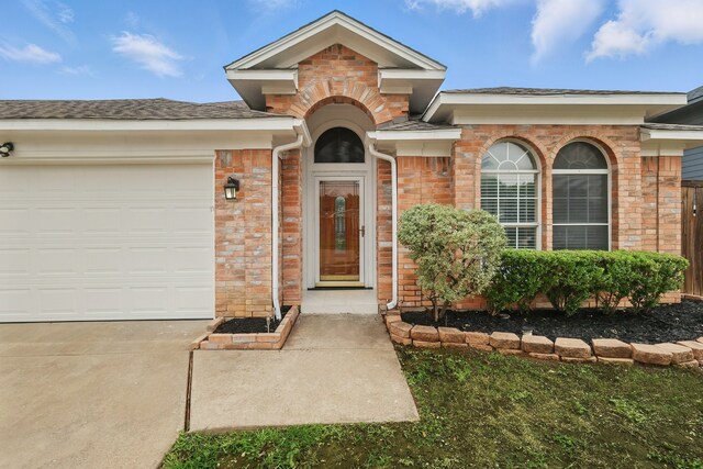 3220 Steamboat Dr, Fort Worth, TX 76123 - view of front of property with an attached garage, concrete driveway, and brick siding