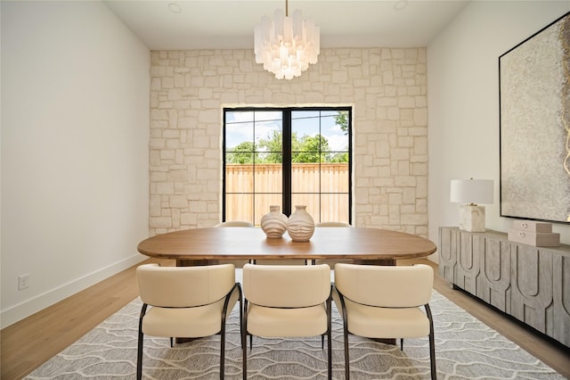 3727 Clover Ln, Dallas, TX 75220 - dining room with wood finished floors and a chandelier