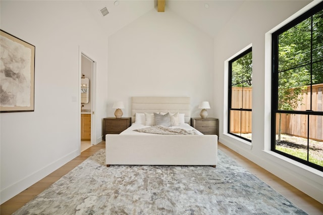 3727 Clover Ln, Dallas, TX 75220 - bedroom with multiple windows and wood finished floors