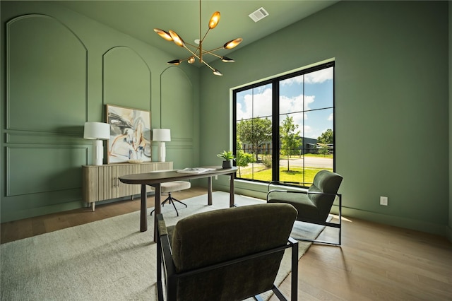 3727 Clover Ln, Dallas, TX 75220 - office area with a chandelier and wood finished floors