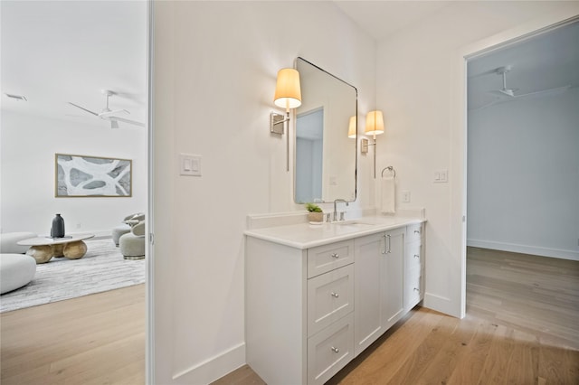 3727 Clover Ln, Dallas, TX 75220 - bathroom featuring vanity and wood finished floors