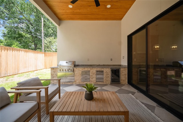 3727 Clover Ln, Dallas, TX 75220 - wooden deck featuring an outdoor kitchen, ceiling fan, and a patio area