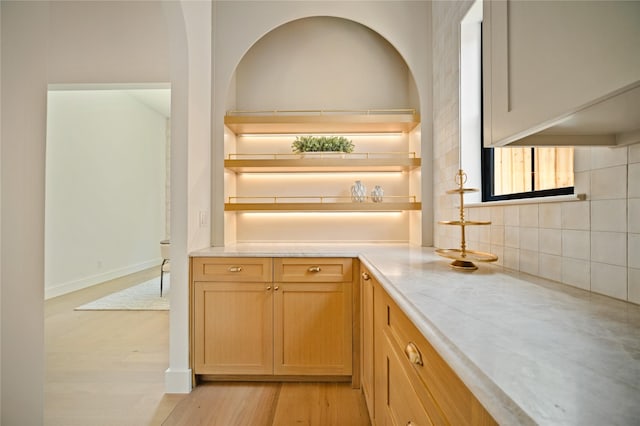 3727 Clover Ln, Dallas, TX 75220 - kitchen with light countertops, tasteful backsplash, light wood-style flooring, and open shelves