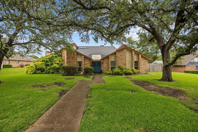 907 Green Terrace Ln, Duncanville, TX 75137 - mid-century modern home featuring brick siding and a shingled roof