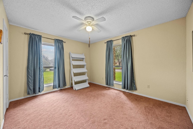 907 Green Terrace Ln, Duncanville, TX 75137 - carpeted spare room with ceiling fan and a textured ceiling