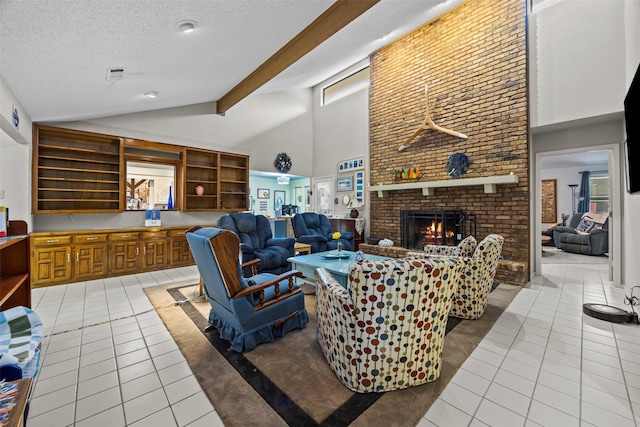 907 Green Terrace Ln, Duncanville, TX 75137 - living area with light tile patterned floors, a brick fireplace, a textured ceiling, high vaulted ceiling, and beamed ceiling