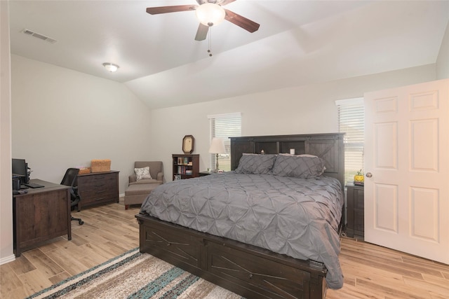 102 Avery Ln, Fate, TX 75189 - bedroom with light wood-type flooring, vaulted ceiling, a desk, and a ceiling fan