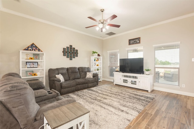 102 Avery Ln, Fate, TX 75189 - living room with ceiling fan, wood finished floors, ornamental molding, and baseboards