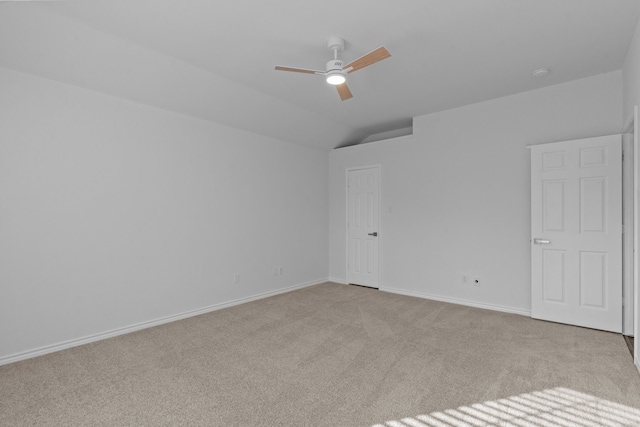 6814 Silver Lake Dr, Rowlett, TX 75089 - unfurnished bedroom featuring carpet floors, baseboards, vaulted ceiling, and a ceiling fan