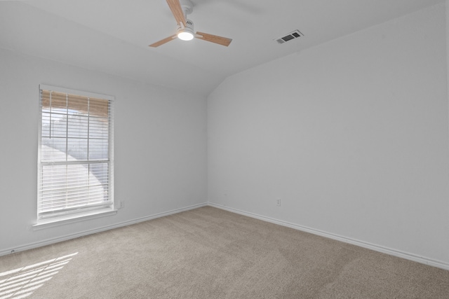 6814 Silver Lake Dr, Rowlett, TX 75089 - carpeted empty room with vaulted ceiling, ceiling fan, and baseboards