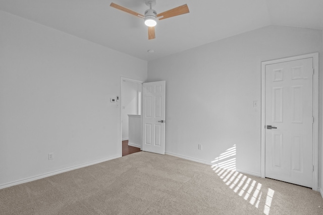 6814 Silver Lake Dr, Rowlett, TX 75089 - unfurnished bedroom with carpet flooring, baseboards, ceiling fan, and lofted ceiling