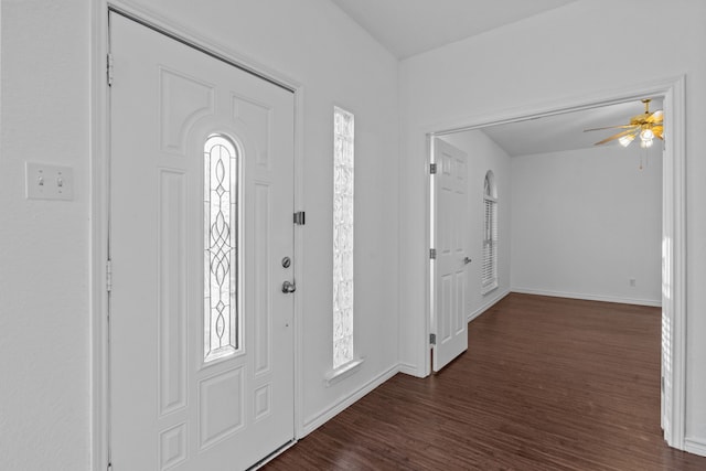 6814 Silver Lake Dr, Rowlett, TX 75089 - foyer entrance featuring dark wood-type flooring, ceiling fan, and baseboards