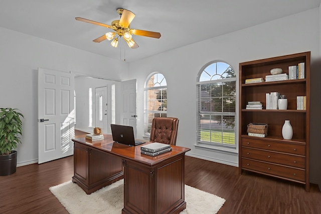 6814 Silver Lake Dr, Rowlett, TX 75089 - office featuring dark wood finished floors, ceiling fan, and baseboards