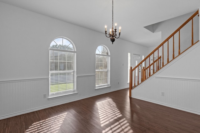 6814 Silver Lake Dr, Rowlett, TX 75089 - interior space with stairs, wainscoting, wood finished floors, a chandelier, and baseboards
