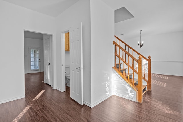6814 Silver Lake Dr, Rowlett, TX 75089 - hallway with dark wood-style floors, a chandelier, stairway, and baseboards