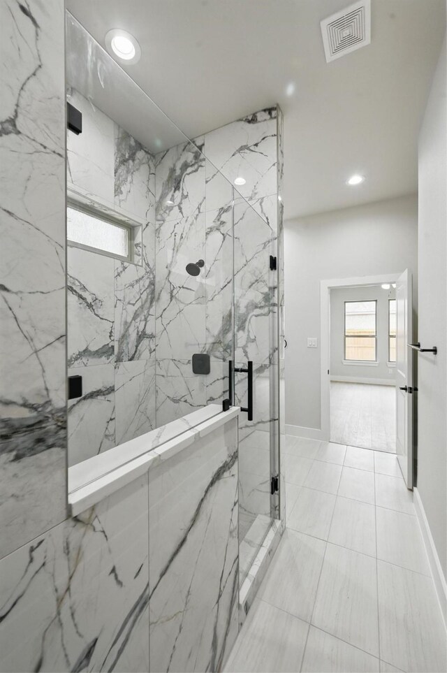 1901 Varsity Dr, Grand Prairie, TX 75051 - bathroom featuring a marble finish shower, recessed lighting, and baseboards
